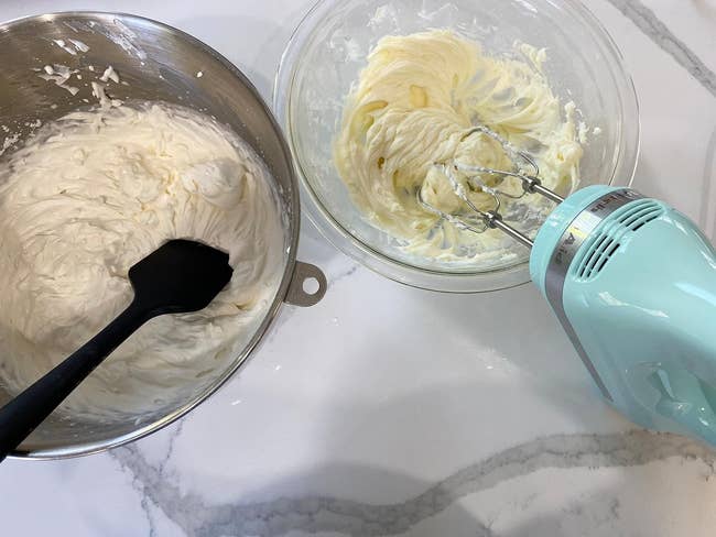 reviewer image of the electric mixer in a bowl of whipped cream