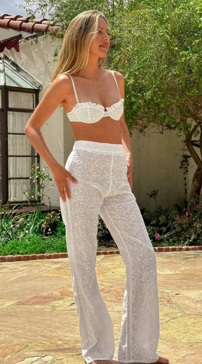 A model wearing the pants with a matching bra