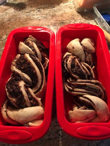 reviewer's baked babka in two of the red silicone pans