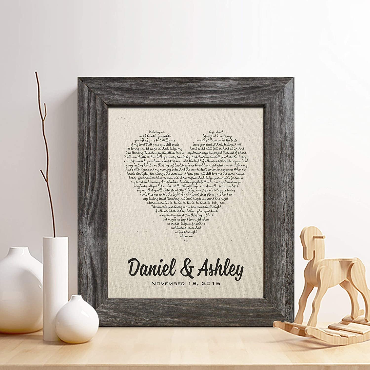 lyrics to a song in the shape of a hear with daniel and ashley at the bottom and a date