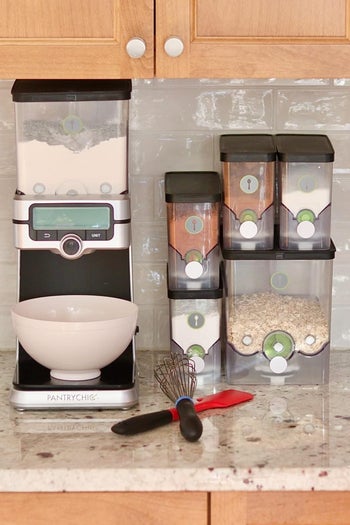 reviewers smart dispenser measuring ingredients into a bowl