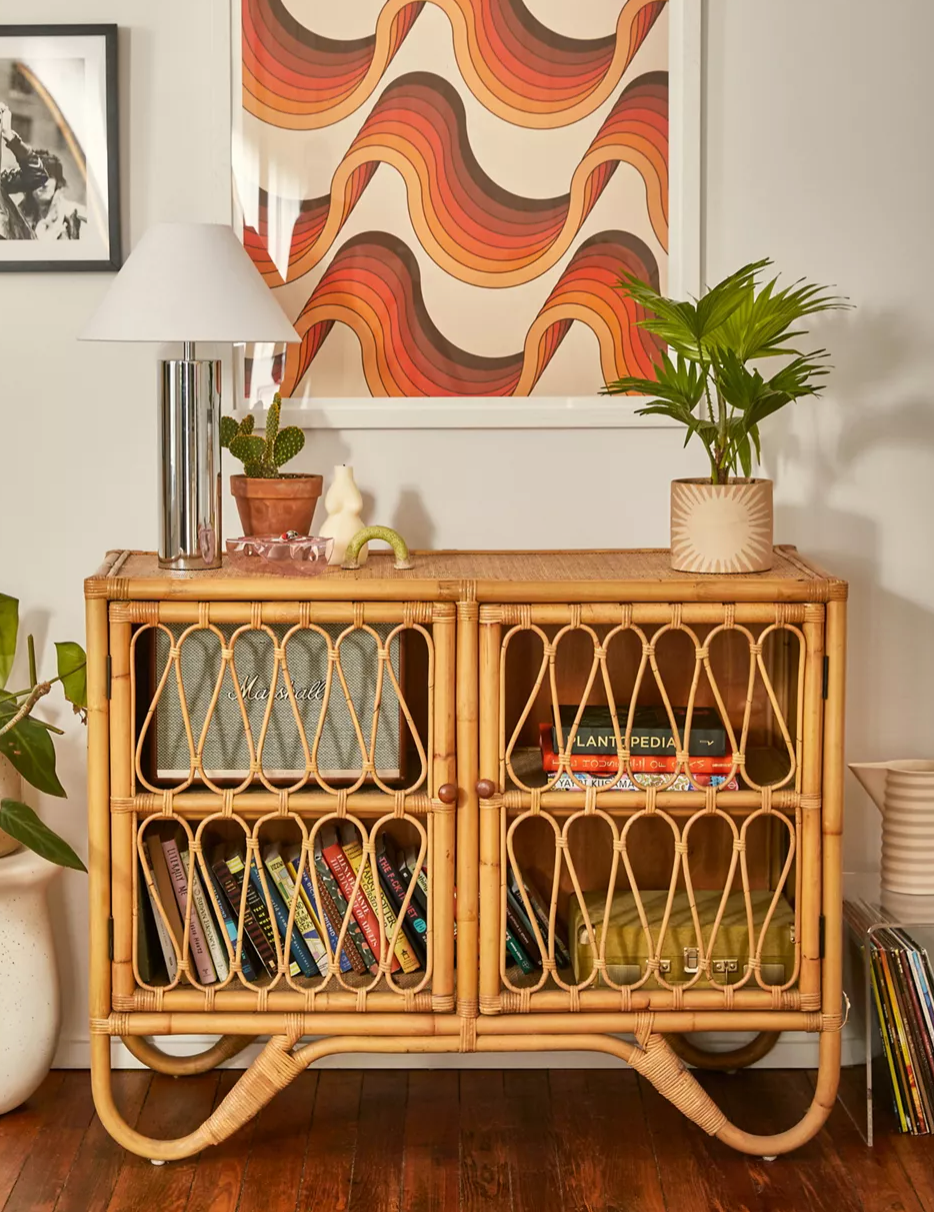 Brown rattan made from wicker with books inside the shelves