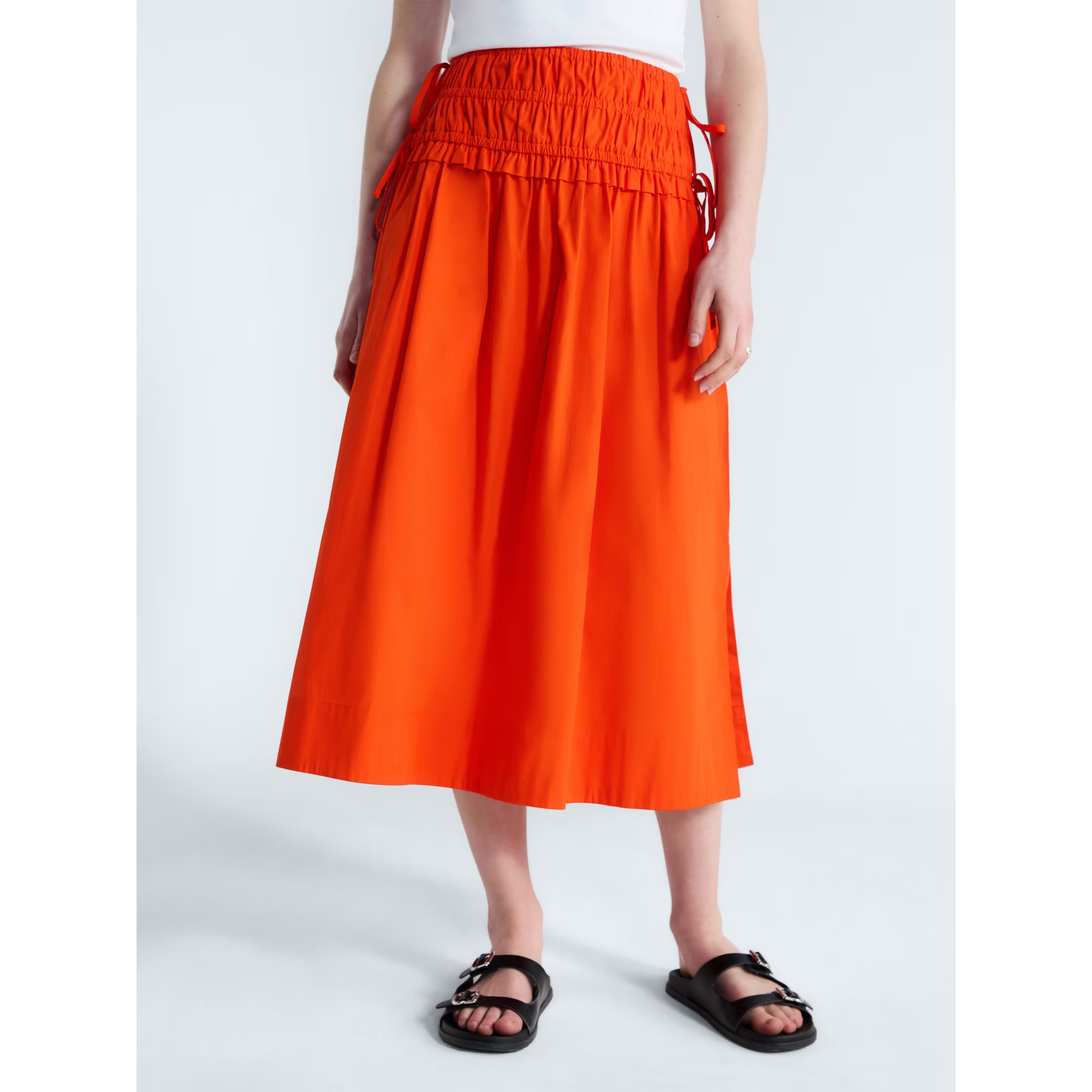 A adjacent  up   of the skirt worn by a model