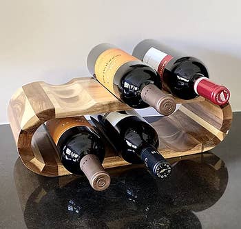 Reviewer image of the wooden wine bottle holder