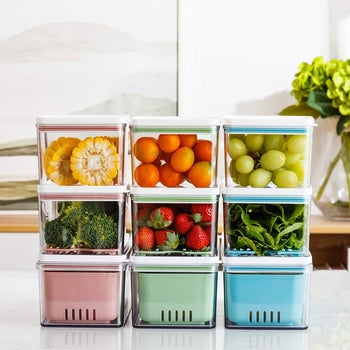 produce bins filled with fruits and vegetables