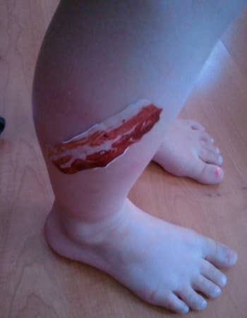 Reviewer leg with a bacon shaped bandage on it 