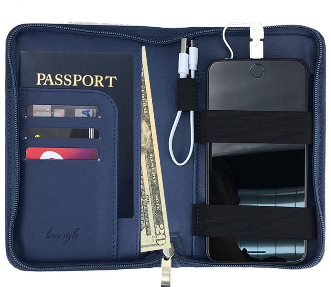 the inside of the blue passport holder, which is holding a charging phone, phone cable, cash, a passport, and credit cards