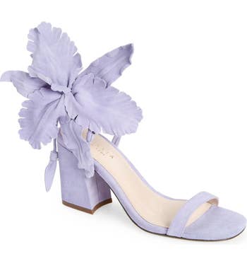 the lavender sandal with a large hibiscus strap design