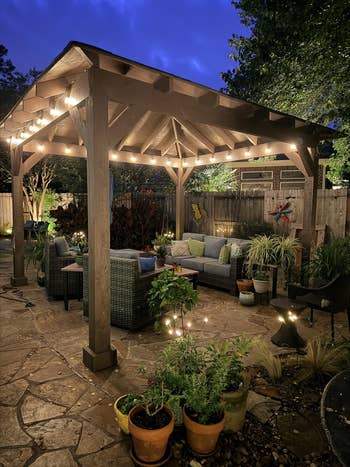 the drawstring lights nether a gazebo