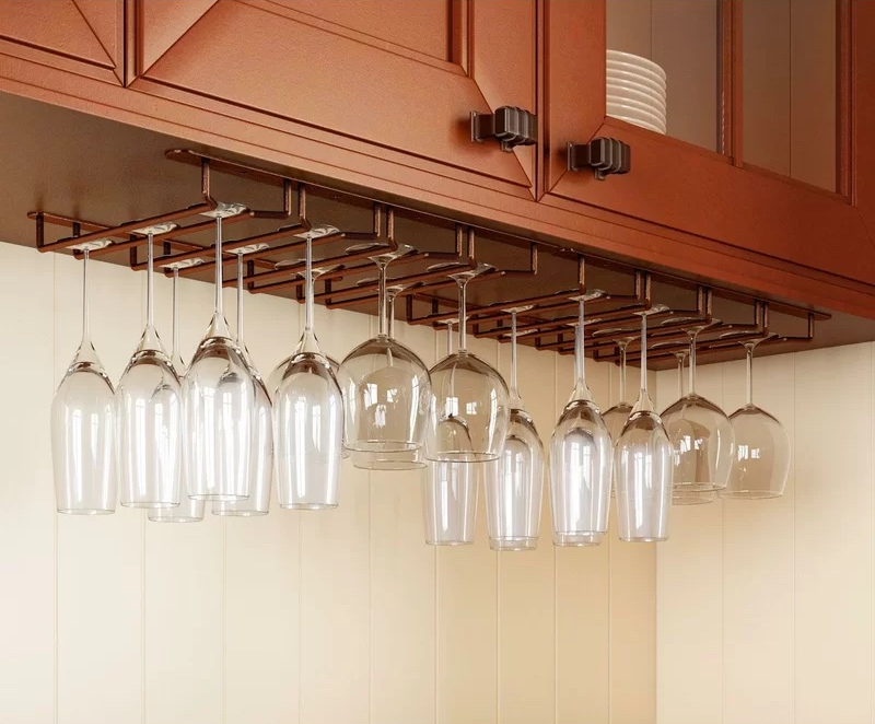 A set of wine glasses hanging on a rack