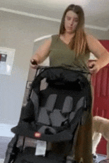 gif of reviewer showing how quickly and compactly the stroller folds up