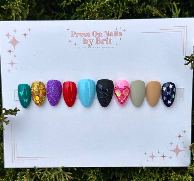 press on nails for each era: debut, fearless, speak now, red, 1989, reputation, lover, folklore, evermore, and midnights