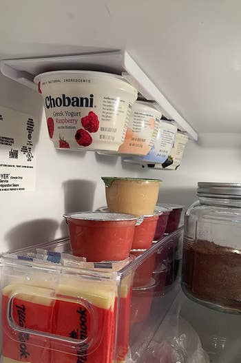 a reviewer's fridge with the organizer storing Chobanis 