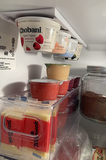 a reviewer's fridge with the organizer storing Chobanis 