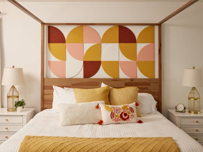 bed with tile design above headboard
