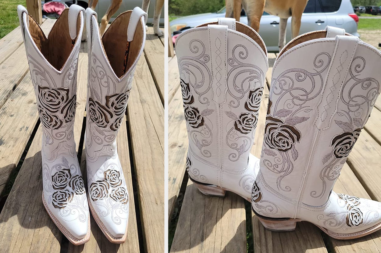 Reviewer image of front and side view of white cowboy boots with dark roses embroidered