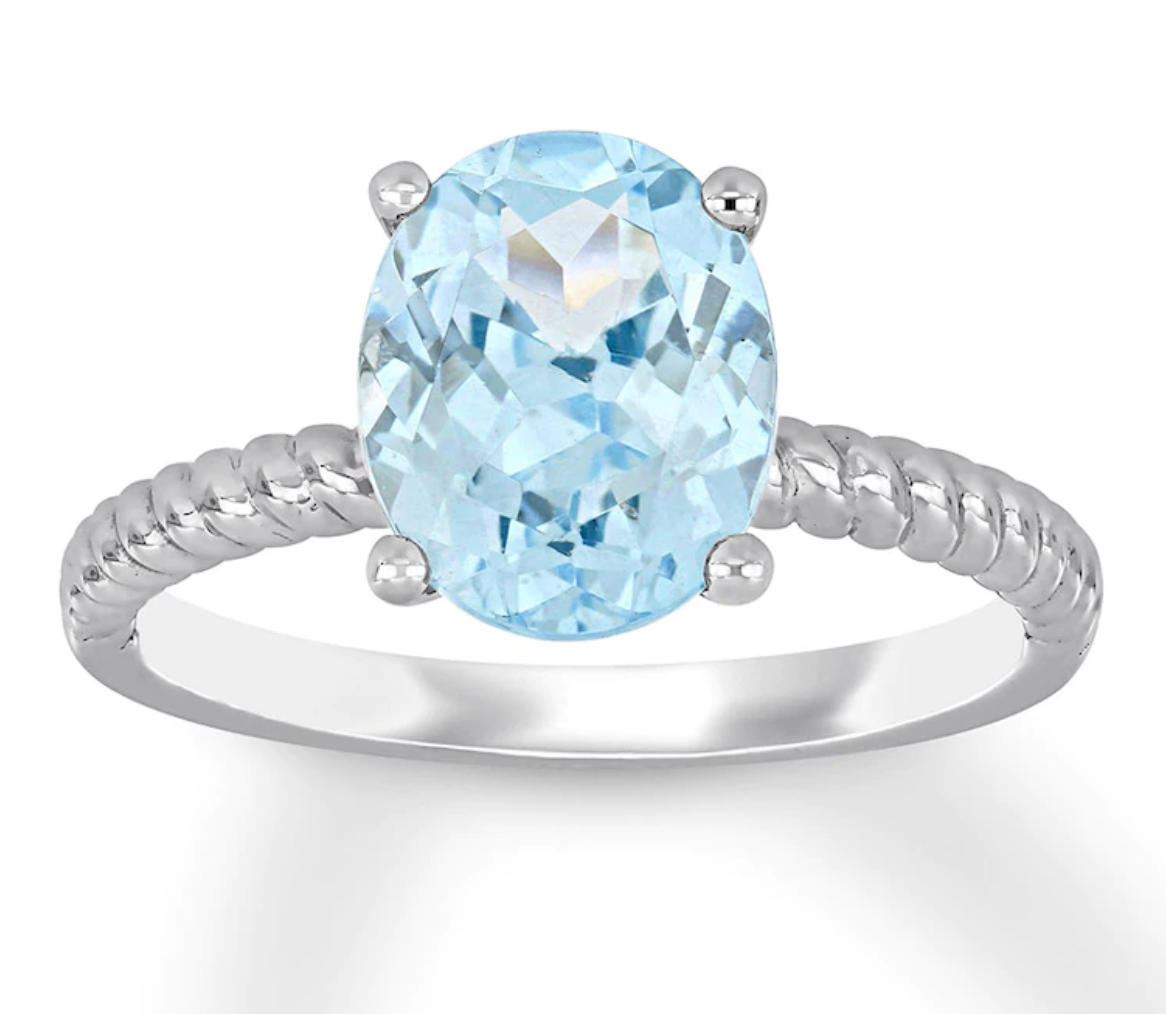 The oval aquamarine ring with a silver rope band