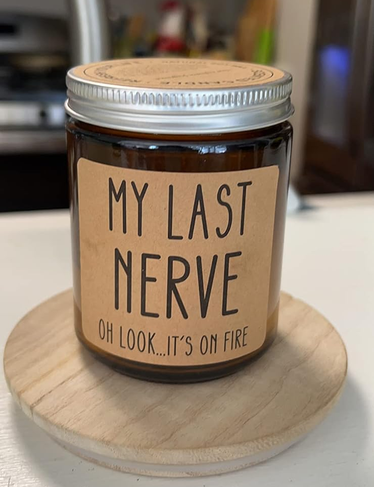 reviewers candle that says 