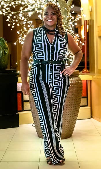 reviewer in the black and white print jumpsuit