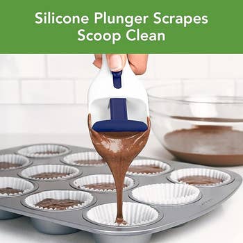 Silicone baking instrumentality   scoops and scrapes batter cleanly into muffin tin lined with insubstantial  cups