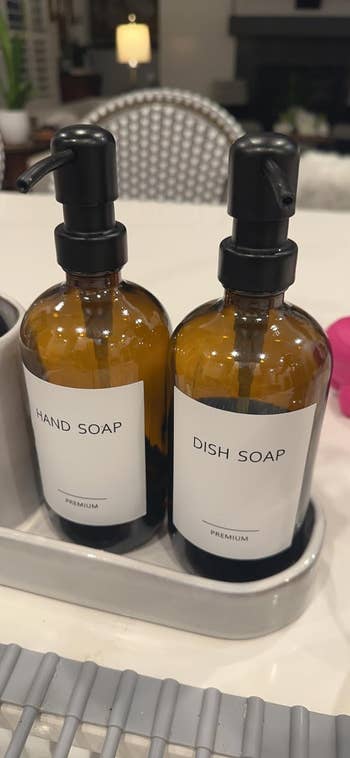 Two brown pump bottles labeled 