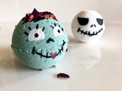 round bath bombs that look like jack and sally from nightmare before christmas