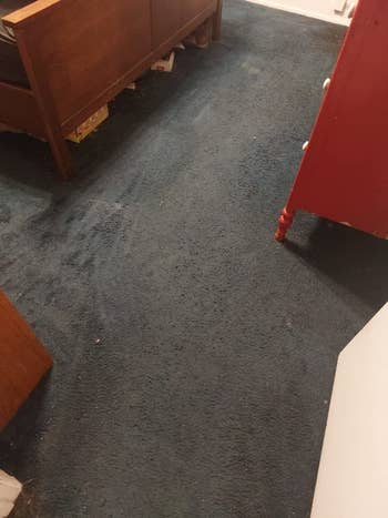 the same carpet looking cleaner after the sweeper was used