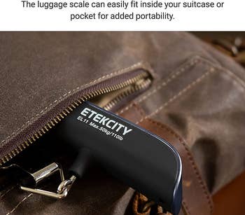 the black luggage scale poking out of the pocket of a travel bag
