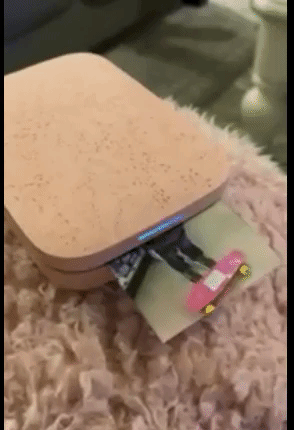 GIF of reviewers Sprocket printing a photo 