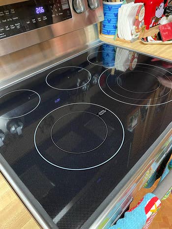 a clean and shiny glass cooktop