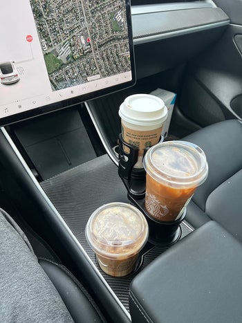 reviewer image of the double cup holder in their car