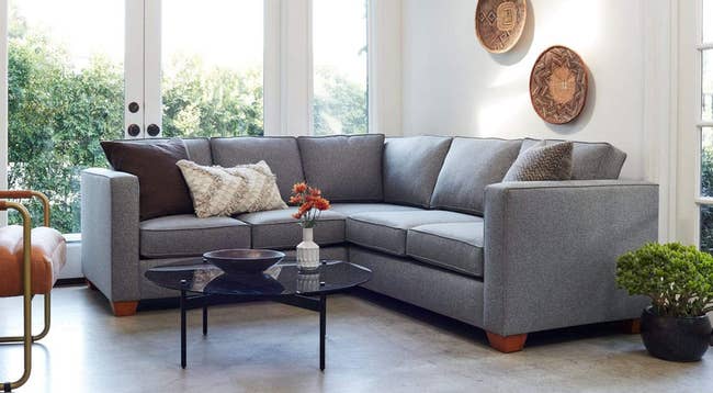 lifestyle image of gray L-shaped couch