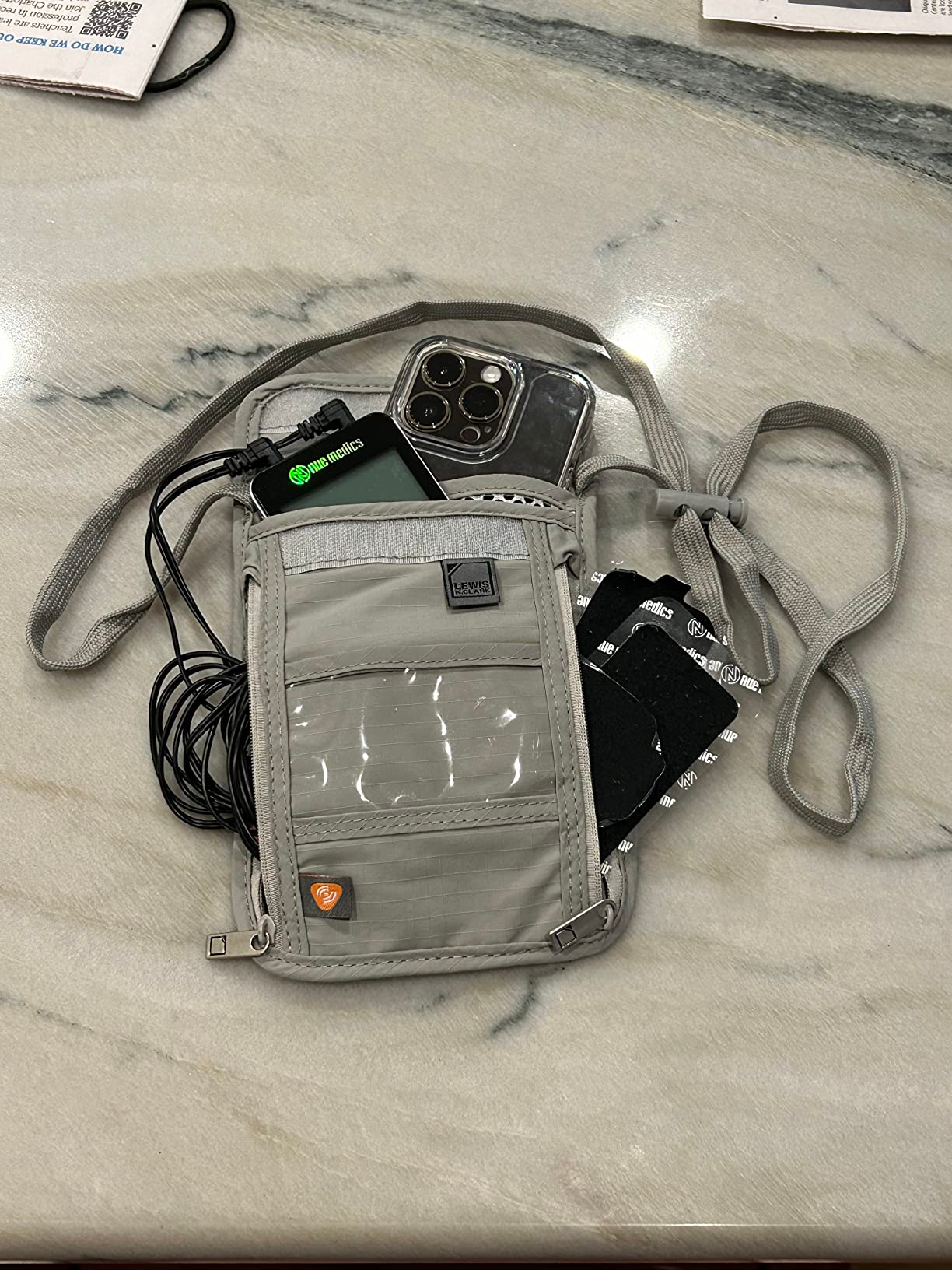 reviewer's pouch with tons of stuff inside