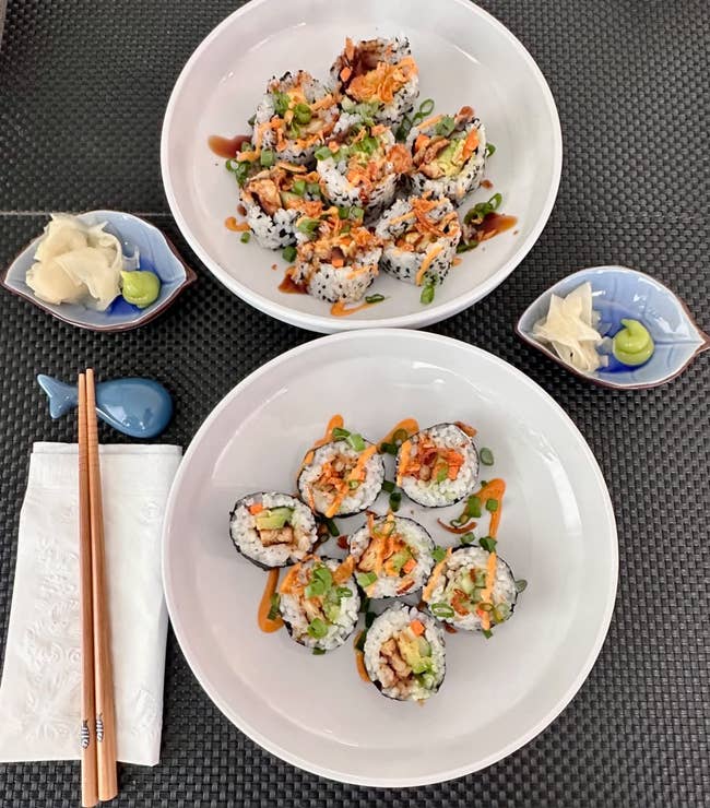 two plates of homemade sushi