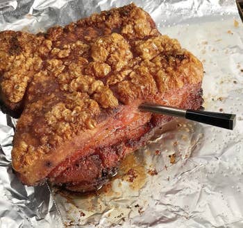 smart meat thermometer inside a piece of pork