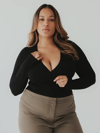 a model wearing the top in black