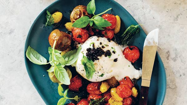 Burrata With Tomatoes, Balsamic Pearls, And Basil Dust