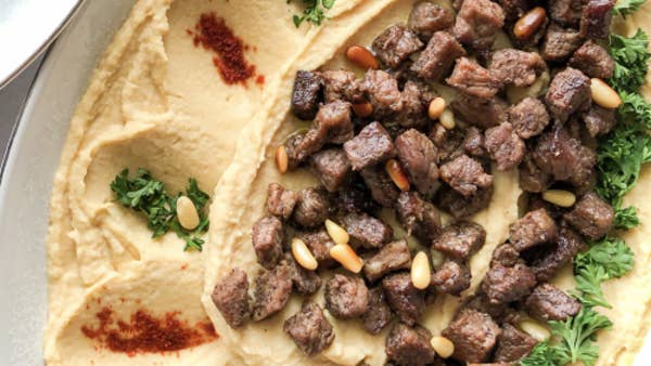 Hummus Topped With Steak