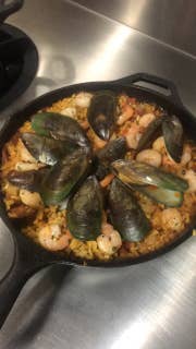 Made a seafood paella in my favorite 17” Lodge cast iron. : r/castiron