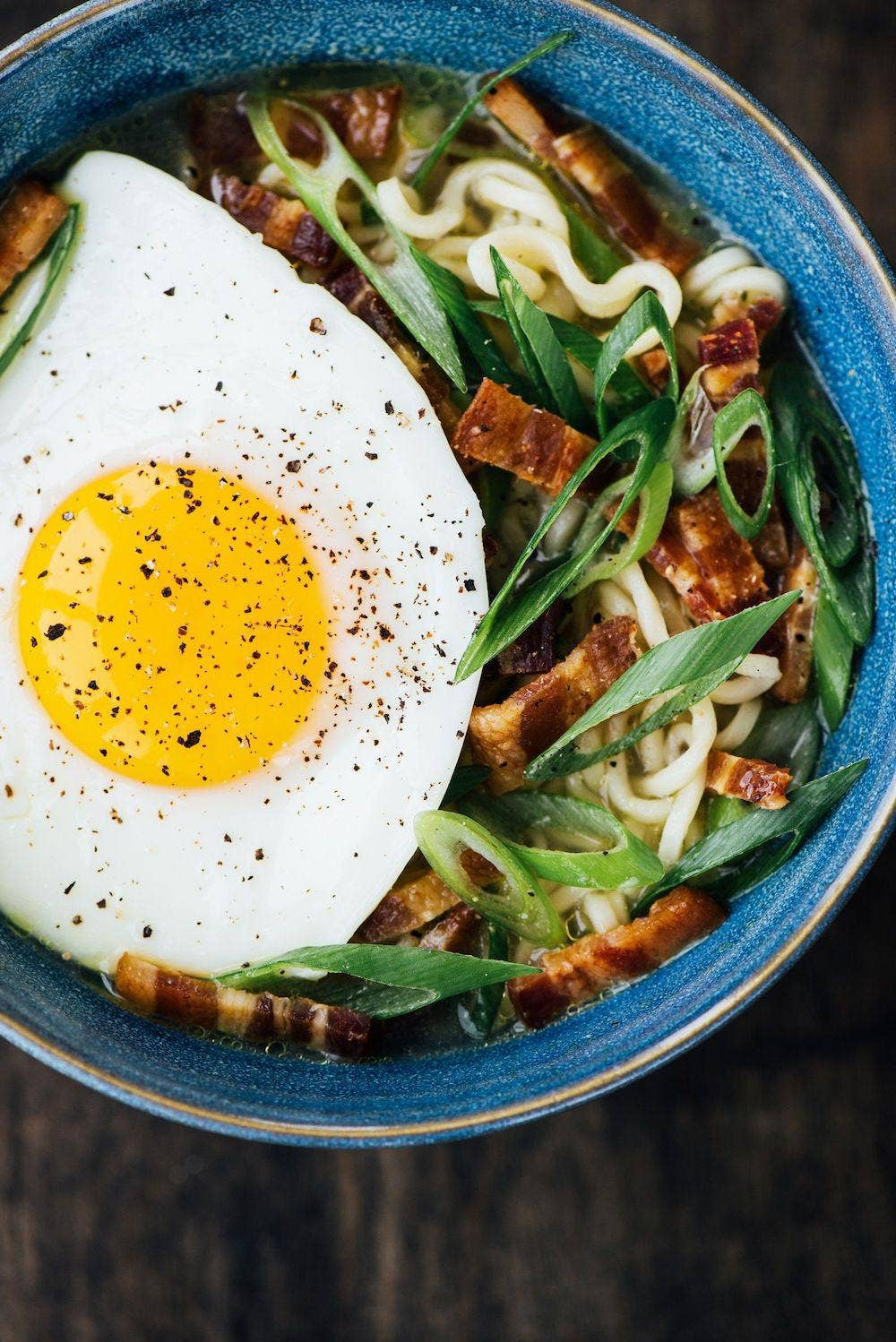 bowl of noodles with a fried egg