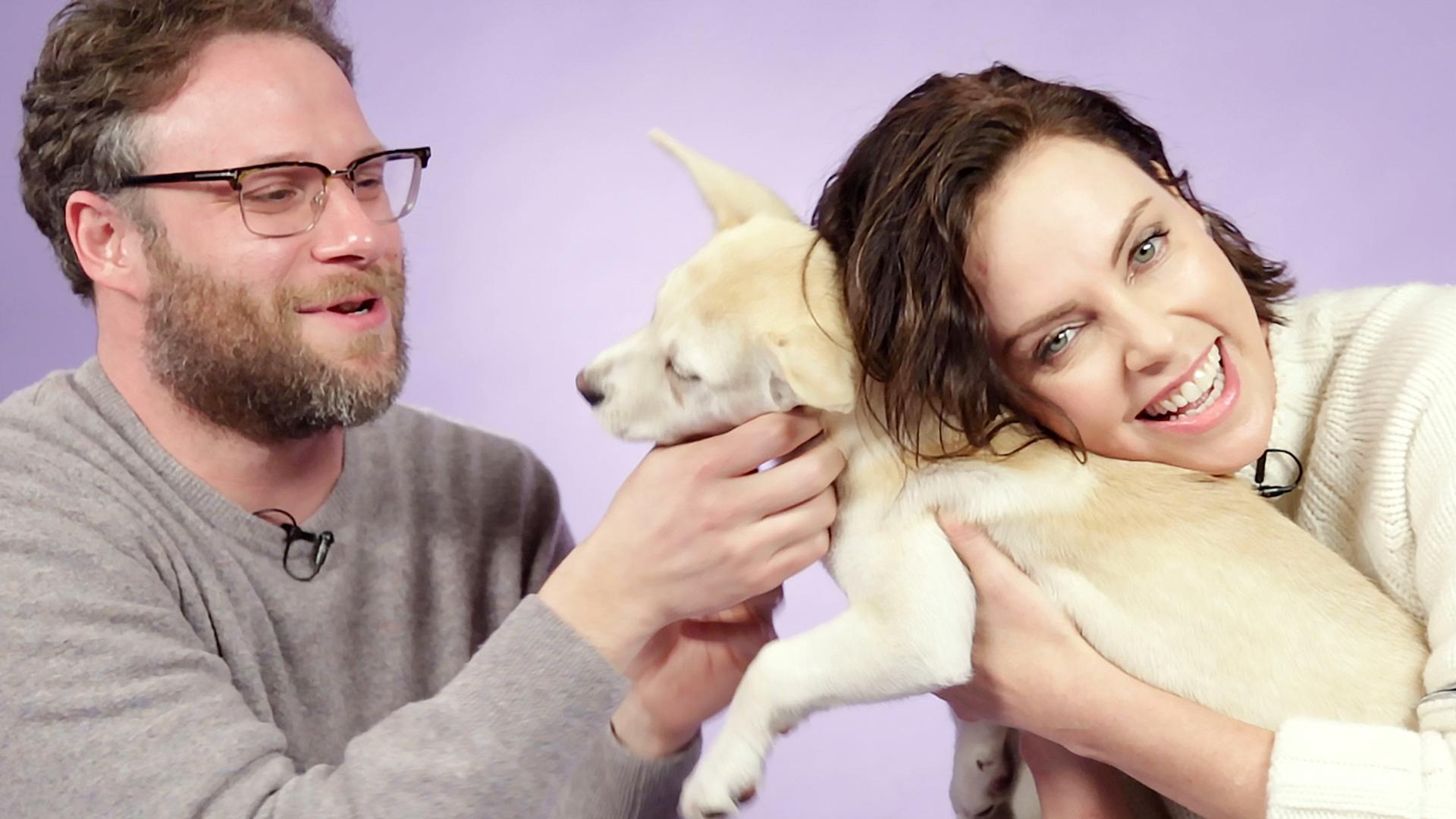 Seth Rogen and Charlize Theron Play With Puppies While Answering Fan ...