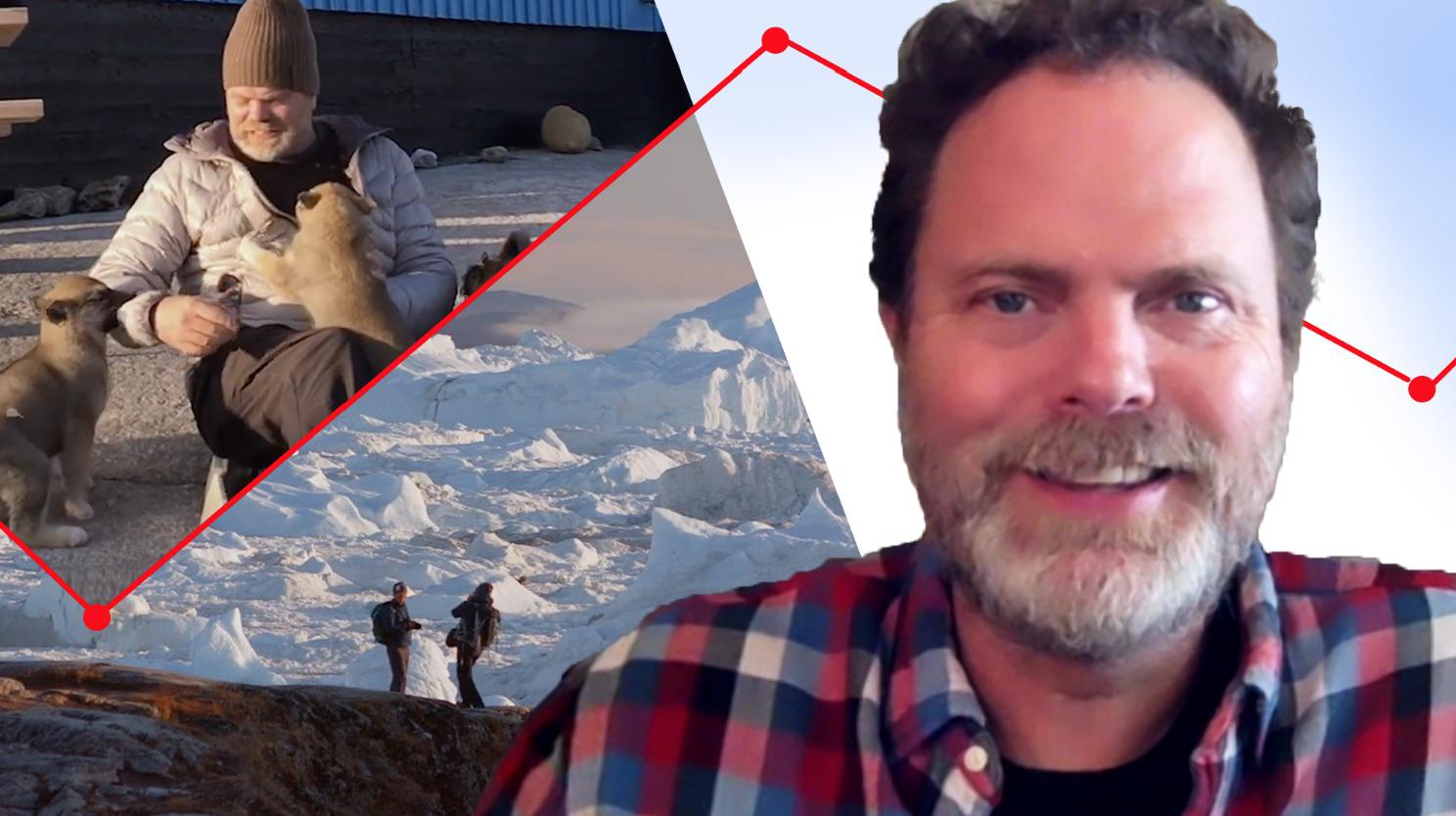 Rainn Wilson smiles, gets bitten by sled dogs, and looks out onto the tundra.
