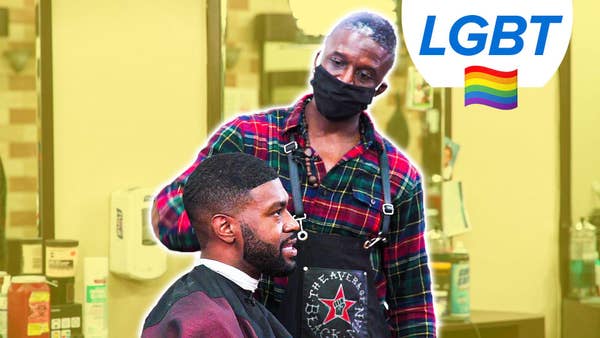 A barber cuts a man's hair