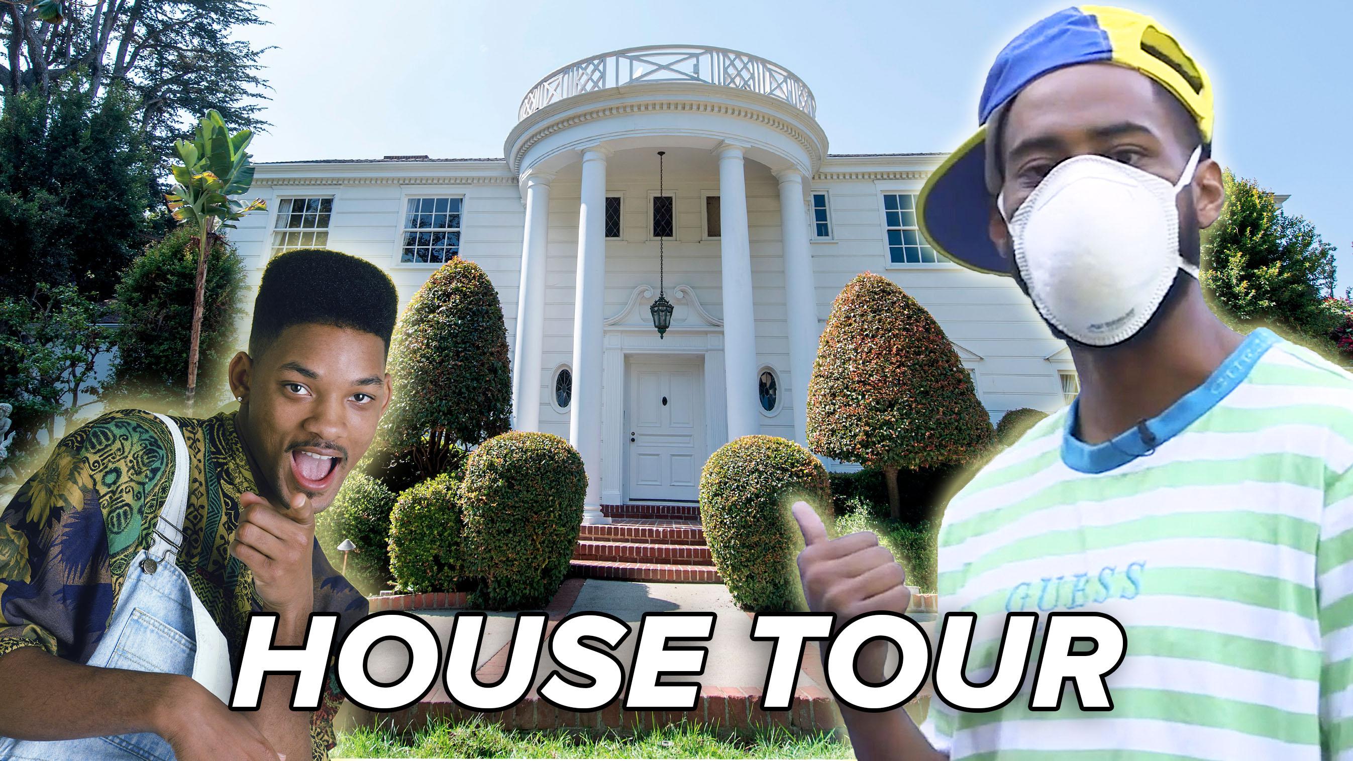 Man stands in front of a mansion