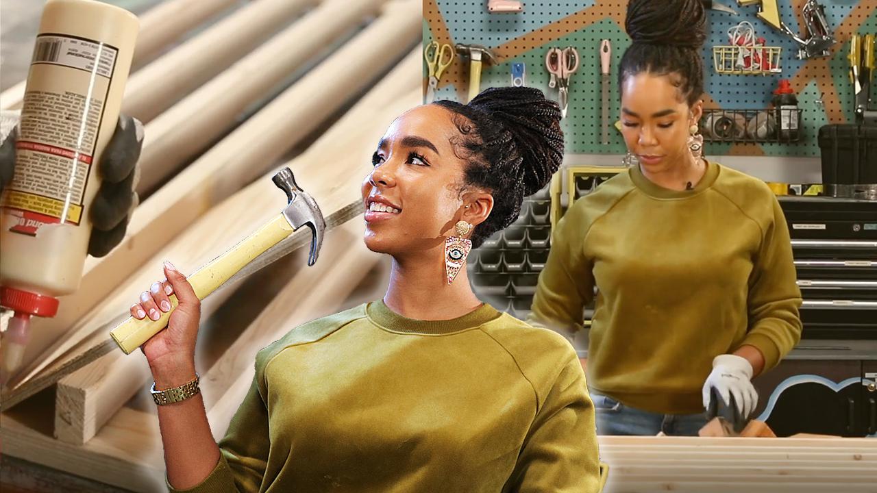 Woman holds a hammer 