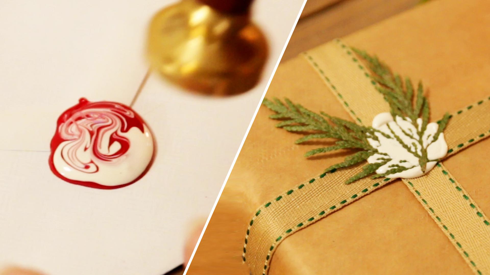 Two wax seals. One is white with evergreen branches and the other is marbled red and white.