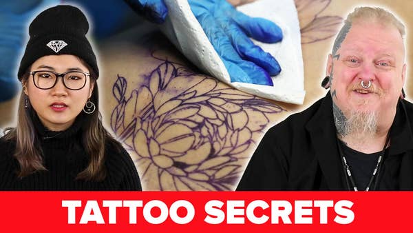 Two tattoo artists and a tattoo.