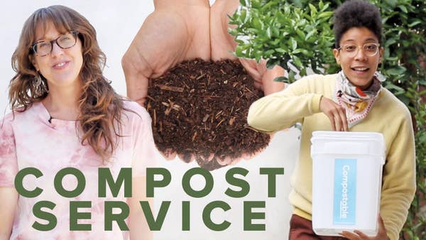 Two women smiling, one holding a compost bin. A hand full of compost in the center.