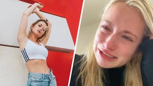 The thumbnail is split into to pictures. One side the model poses for a photoshoot and in the other picture, the model is crying. 