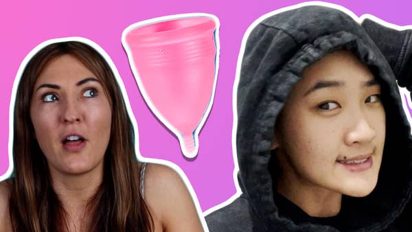 pink background, one side ev is looking shocked, the othre side xander is looking sheepish, a menstrual cup is between them.
